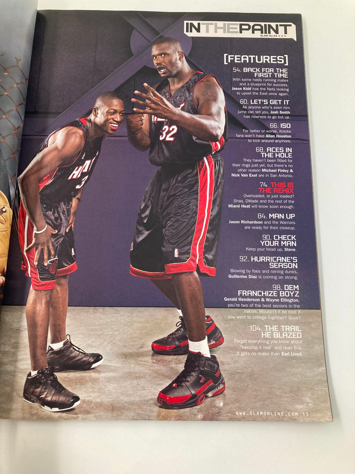 Slam Magazine February 2006 featuring Dwyane Wade and Shaquille O'Neal in action, showcasing their iconic partnership on the court.