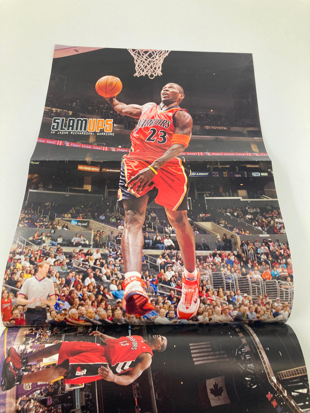 Poster from Slam Magazine May 2006 featuring a basketball player in action wearing jersey number 23.