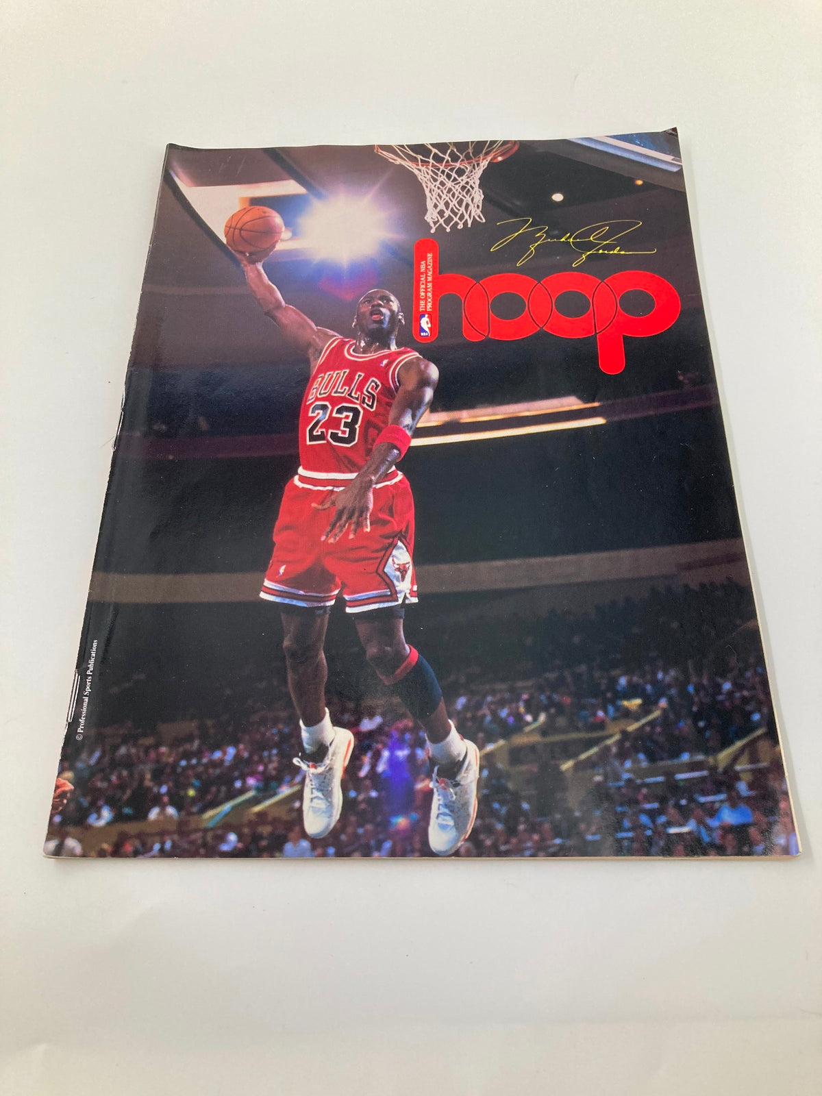 Close-up view of NBA Hoop Magazine 1992 Vol 18 #5 featuring Michael Jordan of the Chicago Bulls on the cover in a dramatic pose.