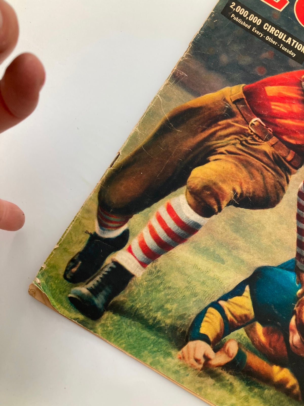 Close-up view of the cover of VTG Look Magazine October 26 1937, showcasing the detailing of the football player and the vintage condition of the magazine.