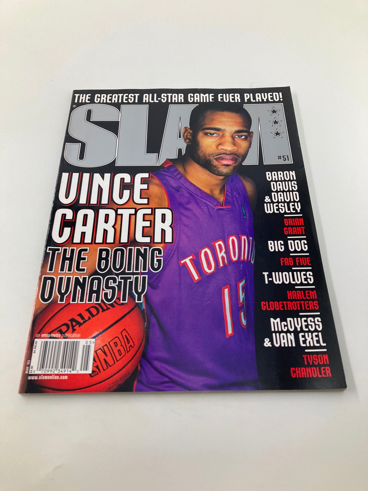 Slam Magazine May 2001 featuring Vince Carter of the Toronto Raptors, showcasing his star presence with the headline 'The Boing Dynasty' and a basketball in hand.