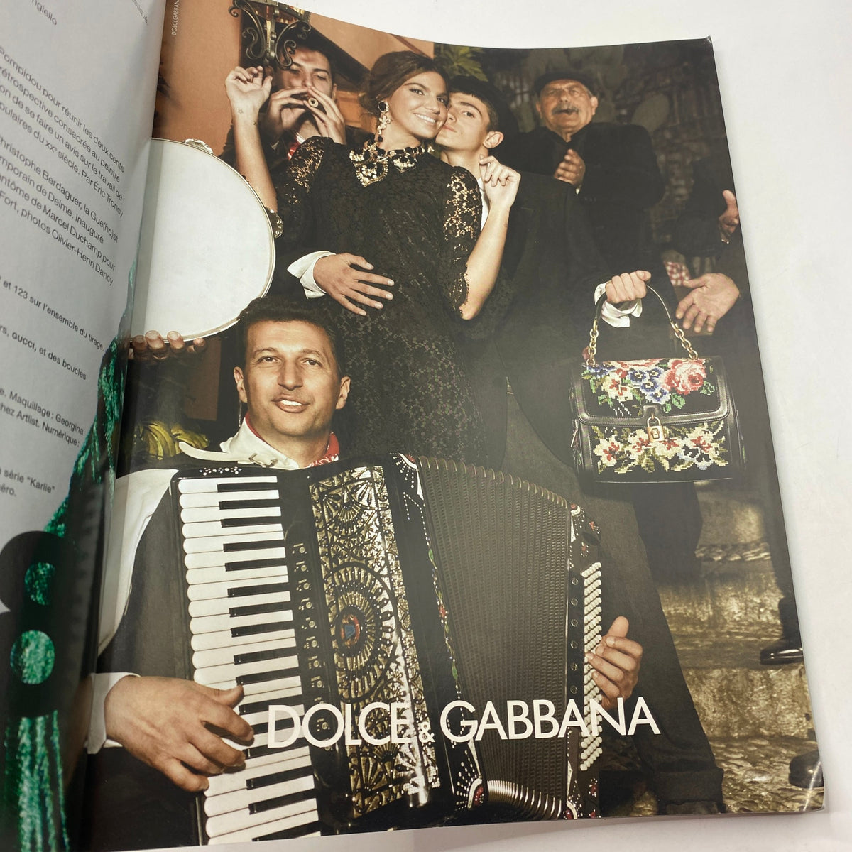 Fashion editorial featuring a Dolce & Gabbana advertisement from Numéro Magazine November 2012 No. 138, showcasing vibrant cultural themes.