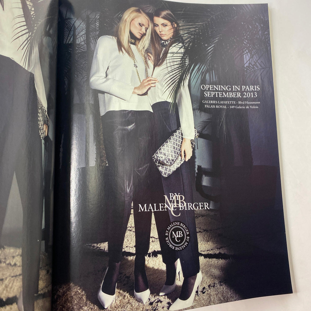 Vogue Paris Magazine September 2013 Cover featuring fashion models in elegant attire, showcasing a Malene Birger advertisement with a Parisian theme.
