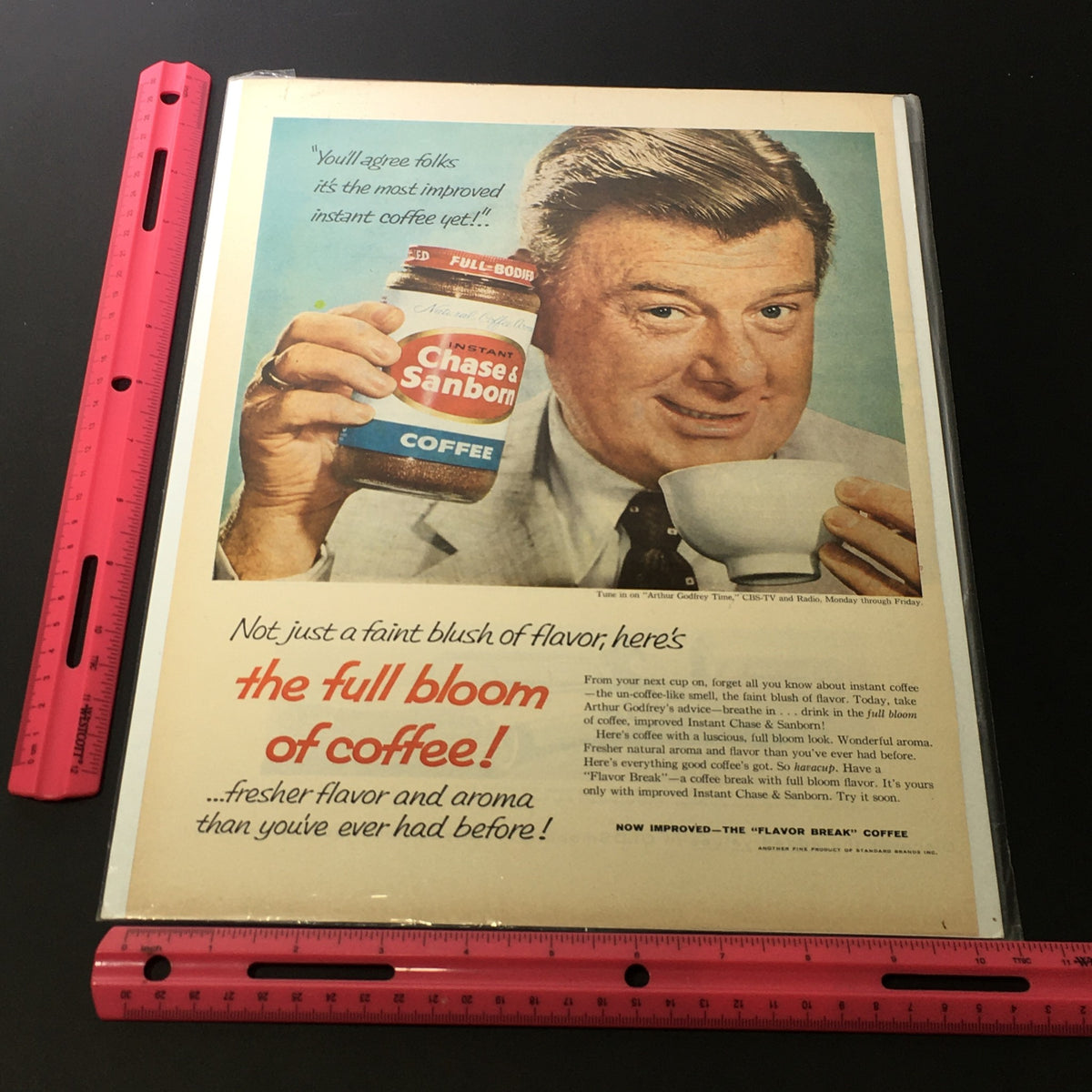 VTG 1958 Chase & Sanborn Full-Bodied Instant Coffee Print Ad featuring Arthur Godfrey along with a measuring tool for scale, emphasizing the ad's dimensions.
