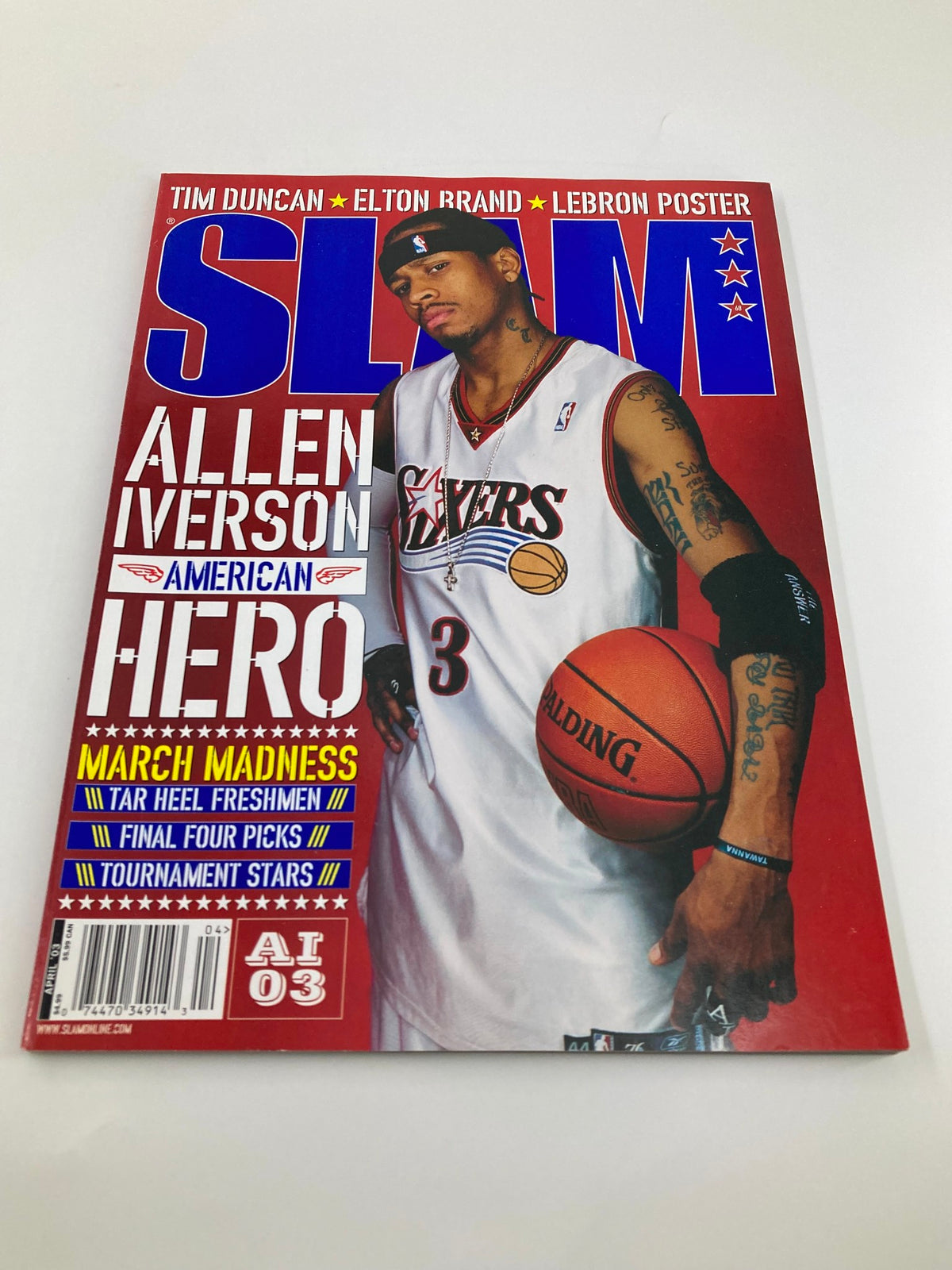 Cover of Slam Magazine April 2003 highlighting Allen Iverson, with a focus on his iconic playing style and branding as an NBA hero.