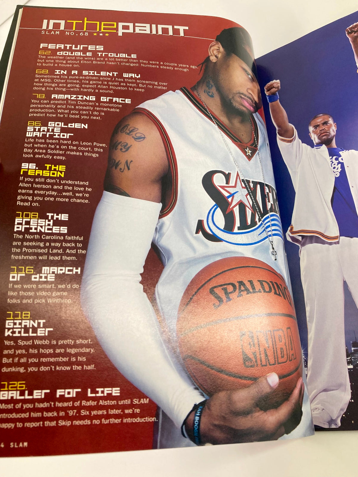 Inside page of Slam Magazine April 2003 detailing features on Allen Iverson, offering insights into his career and influences in the NBA.