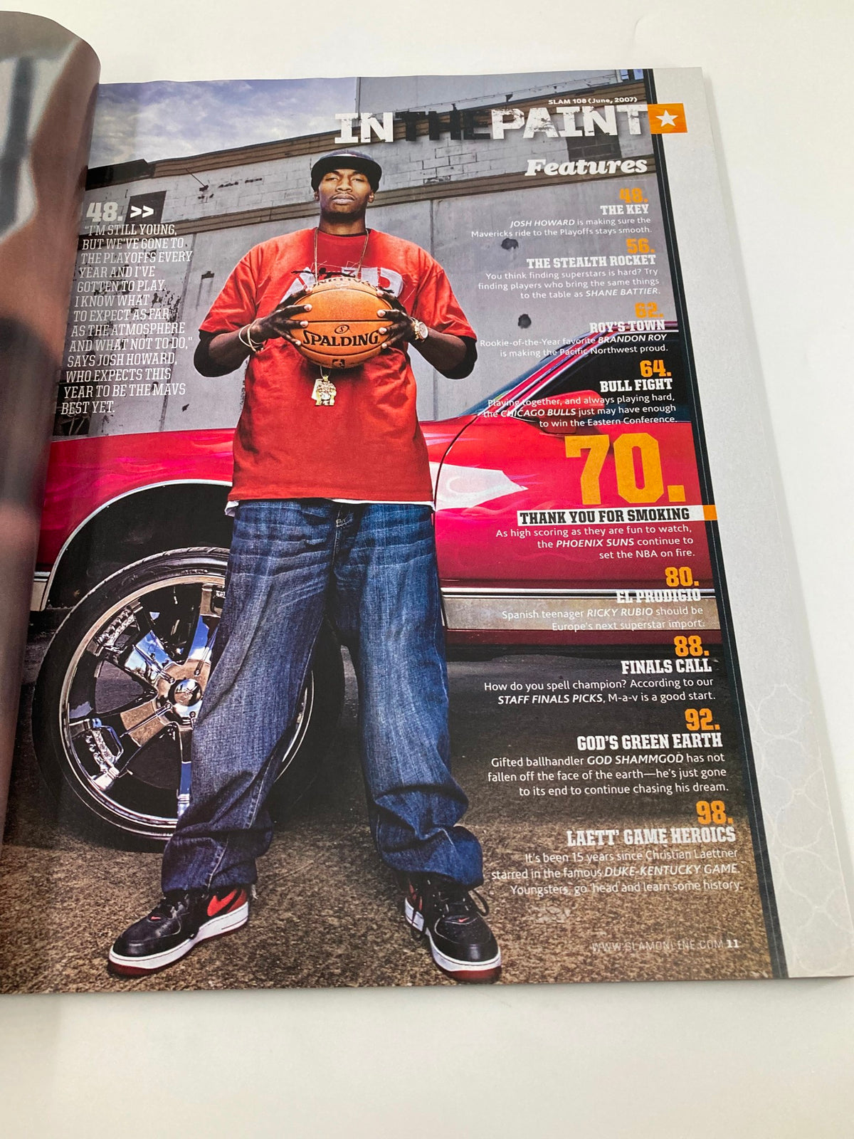 Full-page feature from Slam Magazine June 2007 showcasing a basketball player in a red Spalding t-shirt beside a flashy car, celebrating the vibrant culture of basketball.