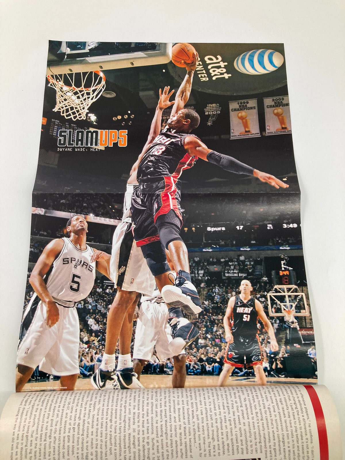 Slam Magazine March 2007 NBA Nuggets Carmelo Anthony with poster, showcasing an impressive slam dunk moment during a game.