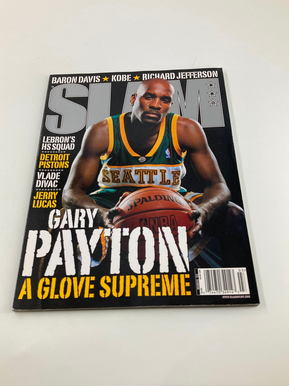 Another view of the Slam Magazine March 2003 featuring Gary Payton, highlighting the magazine's front cover with his name and position.
