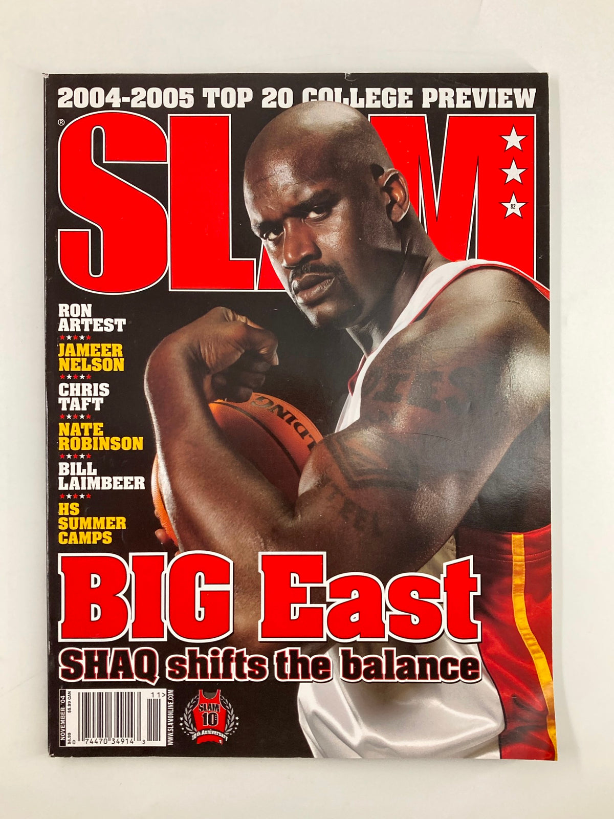 Cover of Slam Magazine November 2004 featuring Shaquille O'Neal, titled 'BIG East: SHAQ shifts the balance', showcasing NBA superstar Shaquille O'Neal during his time with the Miami Heat.