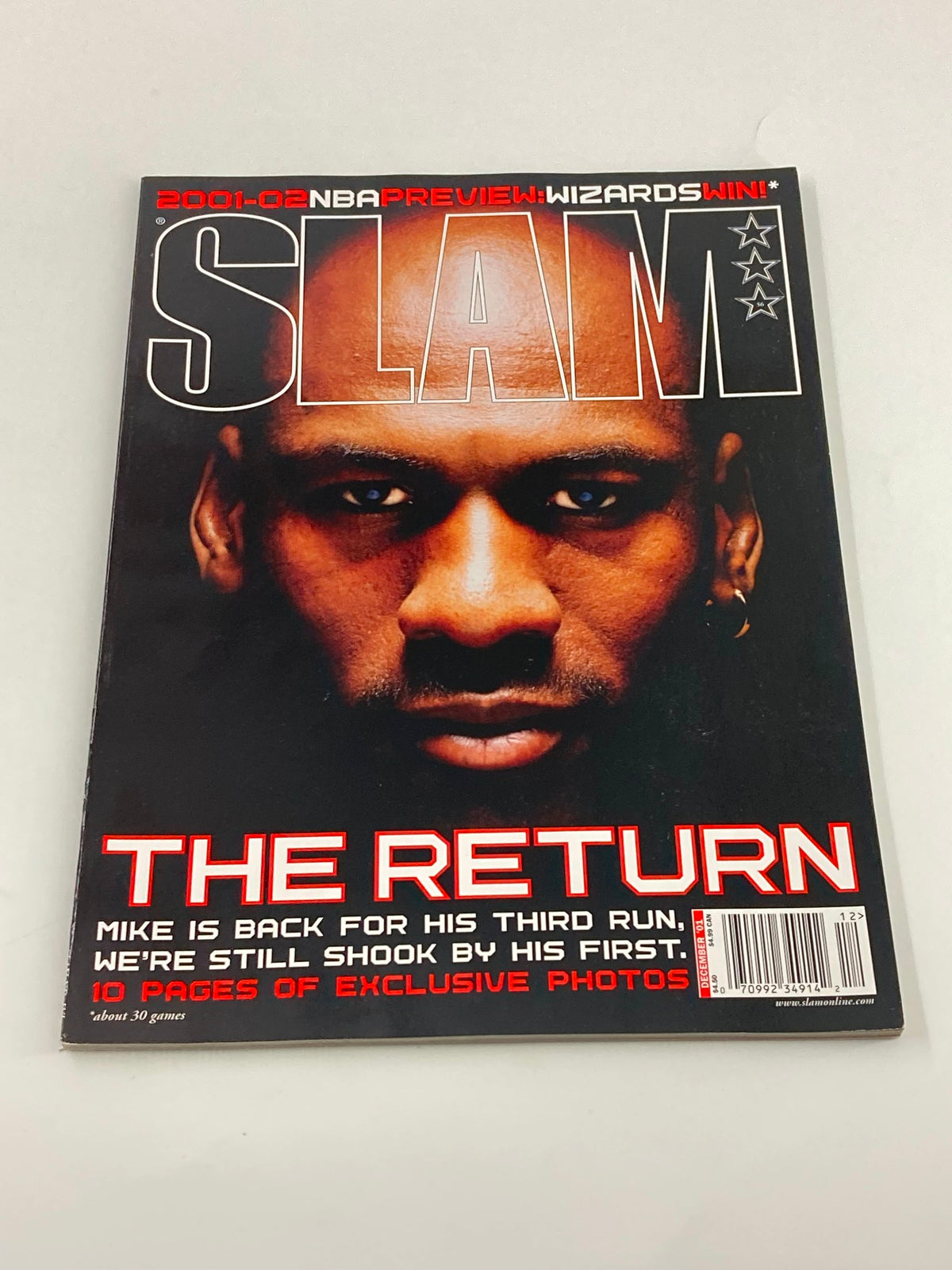 Cover of Slam Magazine December 2001 featuring Michael Jordan, titled 'The Return', showcasing his iconic look and announcing his comeback to the NBA.