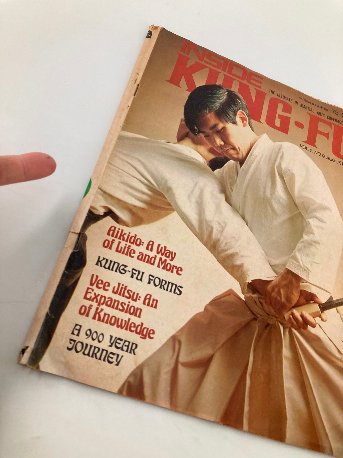 Detailed view of the cover of Inside Kung-Fu Magazine August 1975, highlighting 'Aikido: A Way of Life and More' with a focus on martial arts action.