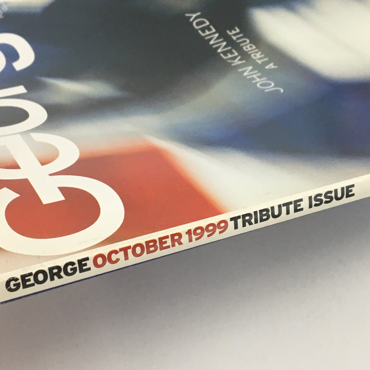 Cover detail from George Magazine October 1999 Tribute Issue to John Kennedy, showcasing the title and special homage to JFK.