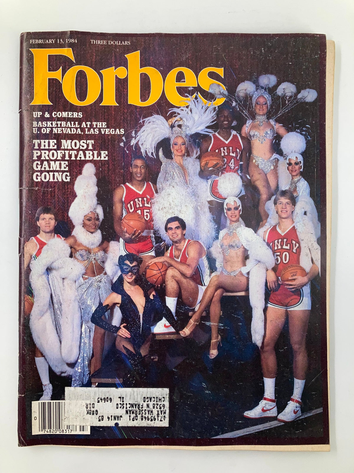 Vintage Forbes Magazine cover from February 13, 1984, featuring the article 'Basketball: The Most Profitable Game Going' with image of basketball players and performers.