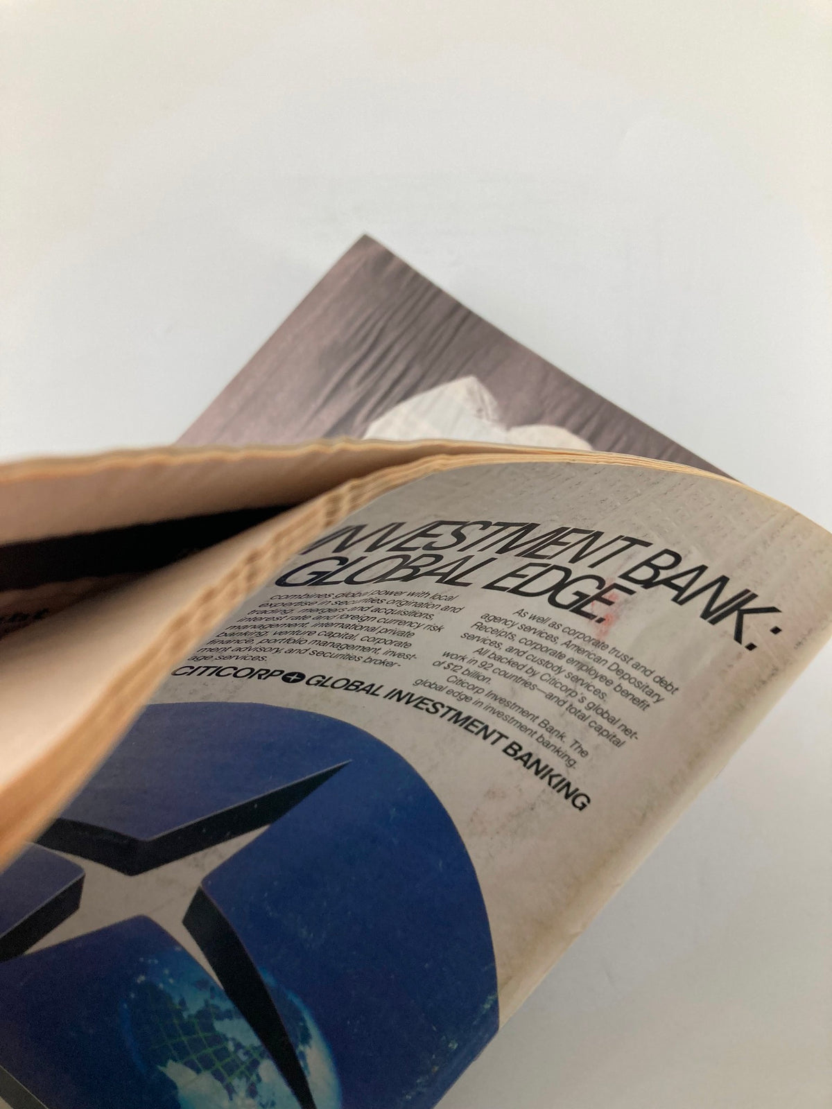 Close-up of the pages from Forbes Magazine July 1, 1985, displaying detailed content on Citicorp's global investment banking strategies and financial services.