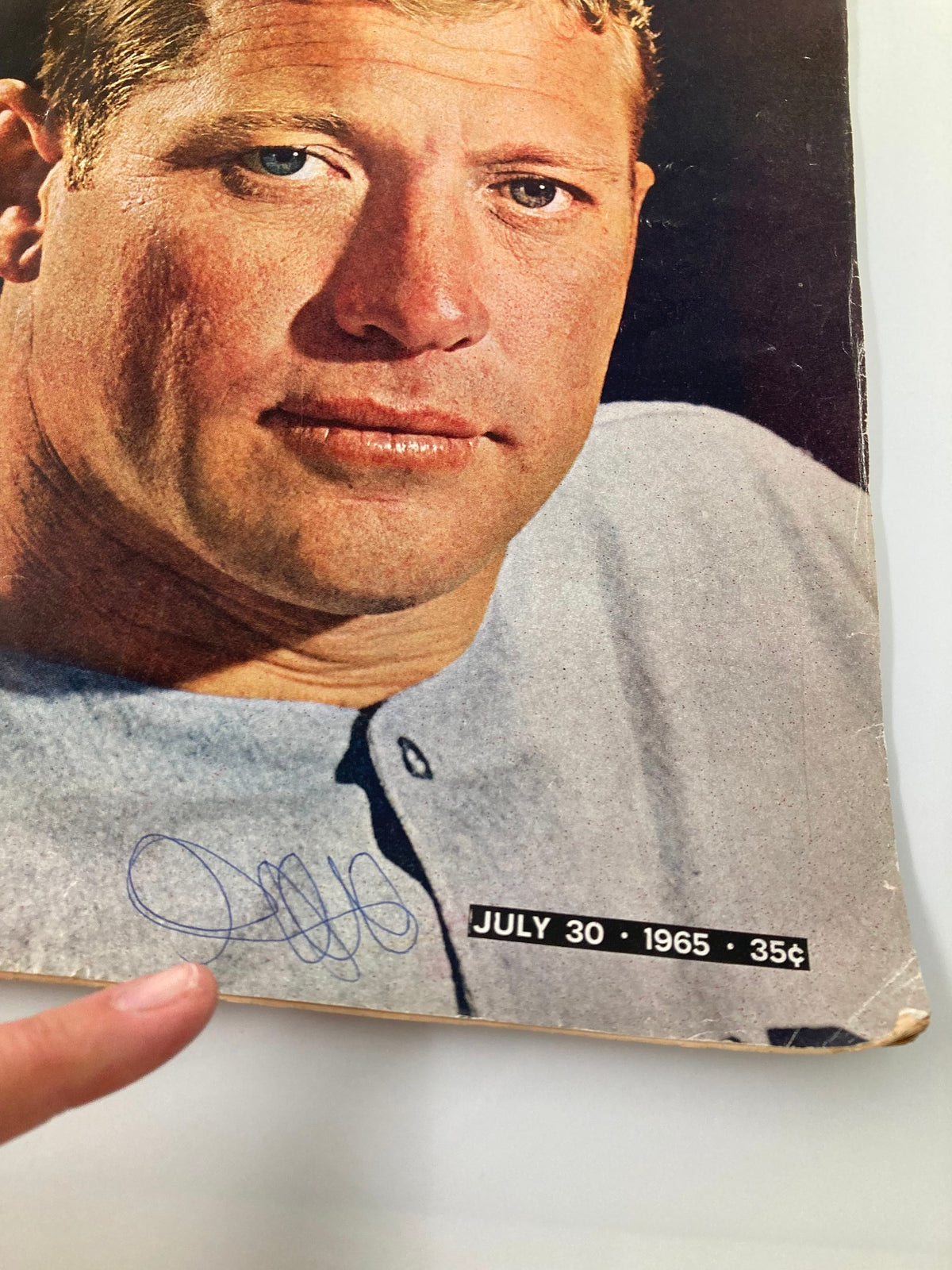 Lower section of the Life Magazine cover dated July 30, 1965, with Mickey Mantle's signature and the magazine price, emphasizing his legacy.