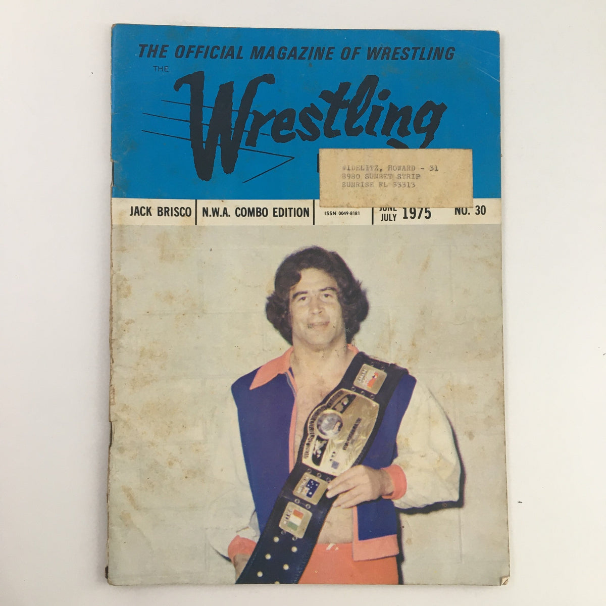 Wrestling Official Magazine June 1975 featuring Jack Brisco on the cover, showcasing vintage wrestling memorabilia.