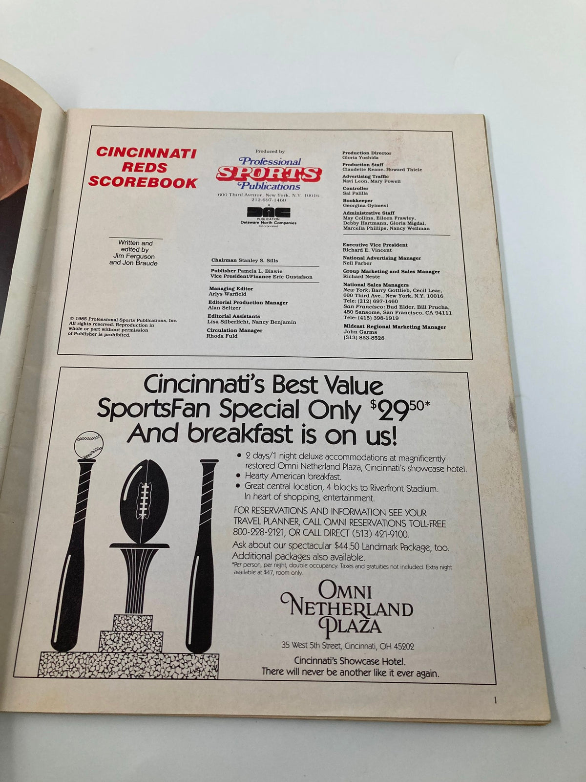 Inside page of the 1985 MLB Cincinnati Reds Official Scorebook Program detailing production credits and features a decorative graphic promoting the Omni Netherland Plaza.