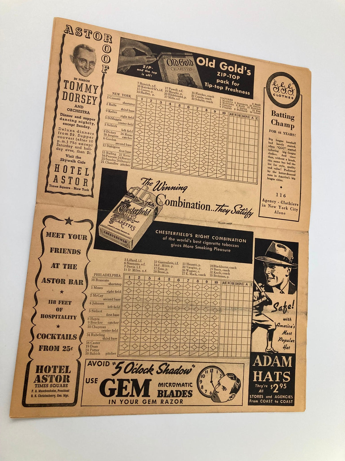 Scorekeeping section of the 1940 The Yankees American League Baseball Club Official Score Card featuring advertisements for local establishments and betting tips.