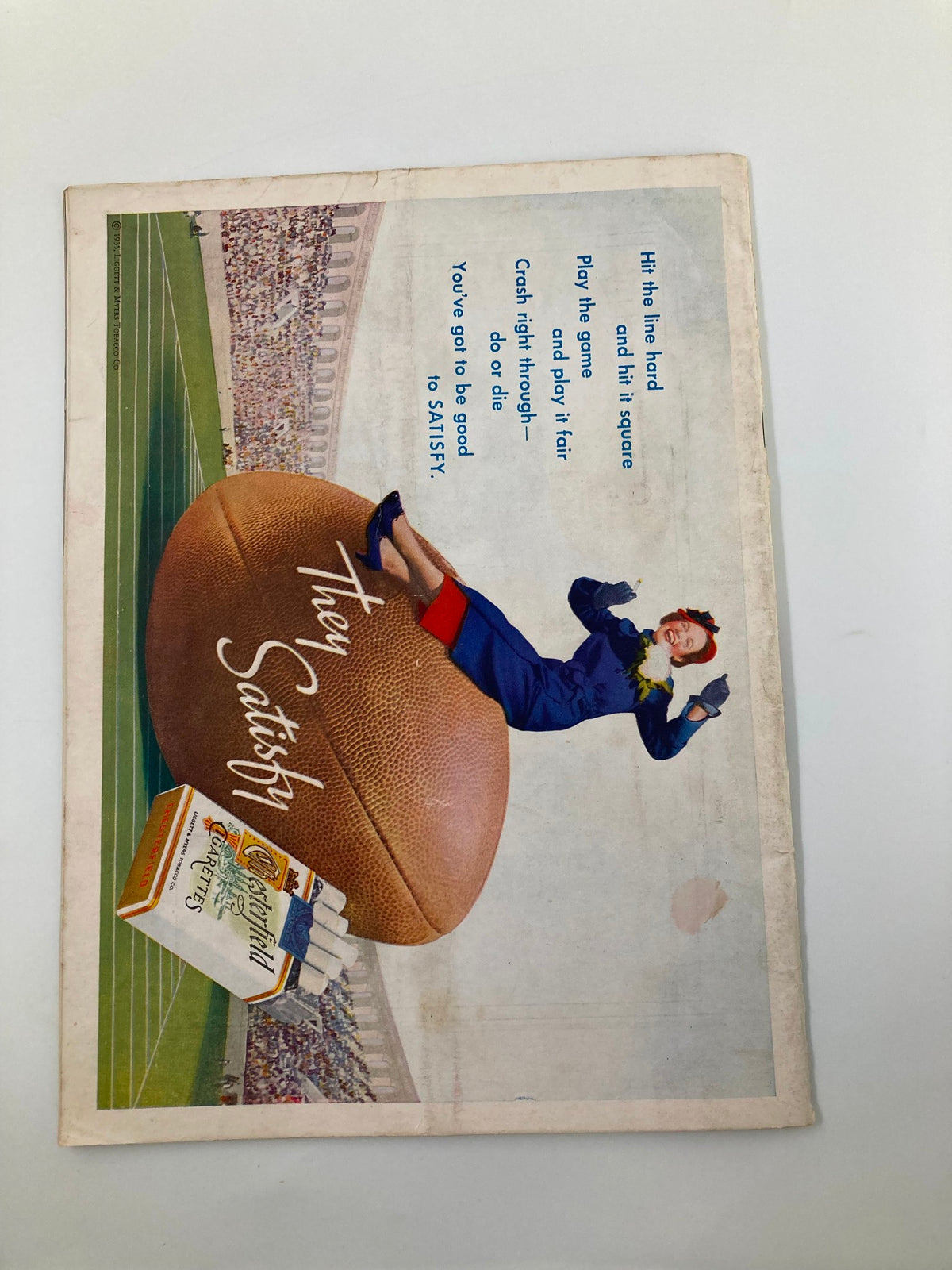Illustrated cover from the 1935 NCAA Football California Gridiron vs St Mary’s Official Program featuring a vintage football-themed advertisement with a female mascot.