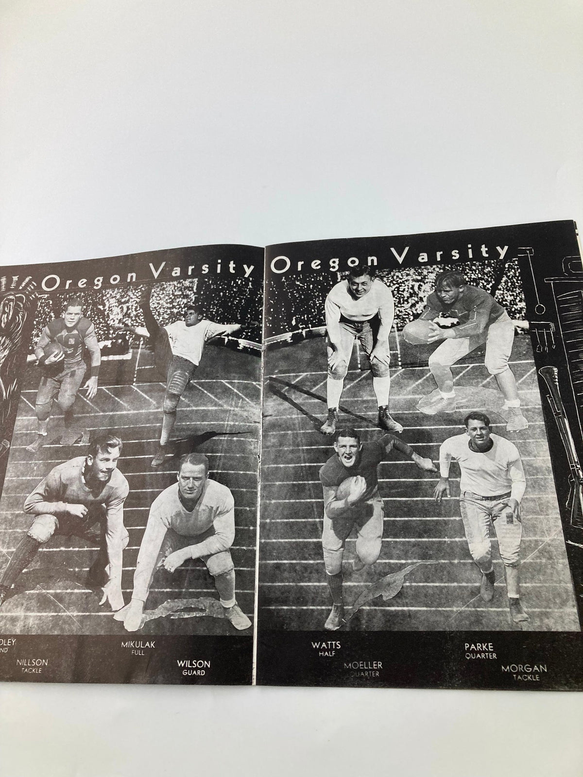 Another page from the 1931 NCAA Football Oregon Ducks vs Saint Mary's Gaels Official Program featuring the Oregon Varsity team photographs and player names on a striking black background.