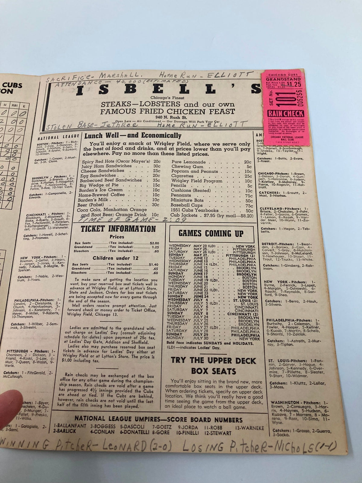 Promotional page from the 1951 MLB Chicago Cubs vs Boston Red Sox Official Program, showcasing Isbell's restaurant offerings and ticket information.
