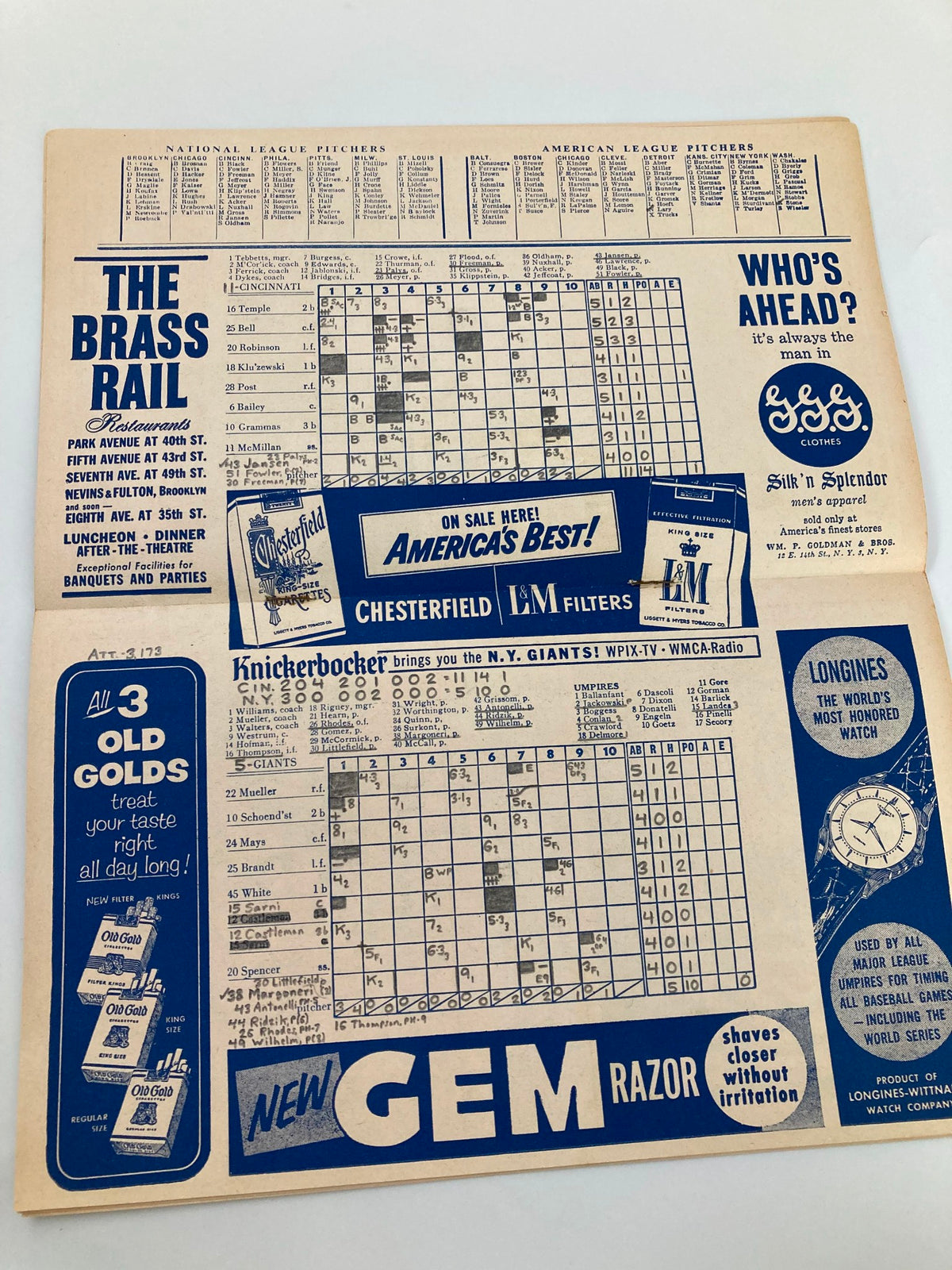 Scoreboard layout from the 1956 MLB New York Giants Official Program and Score Card displaying player statistics and game scores, emphasizing its collectible nature with handwritten details.