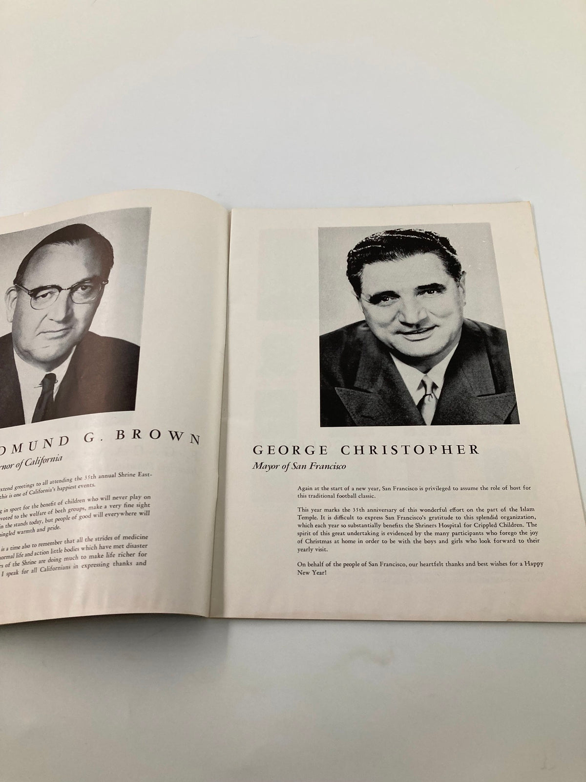 Inside page of the 1960 Islam Temple All-Star Football Game East vs West Official Program featuring portraits of California Governor Edmund G. Brown and San Francisco Mayor George Christopher.