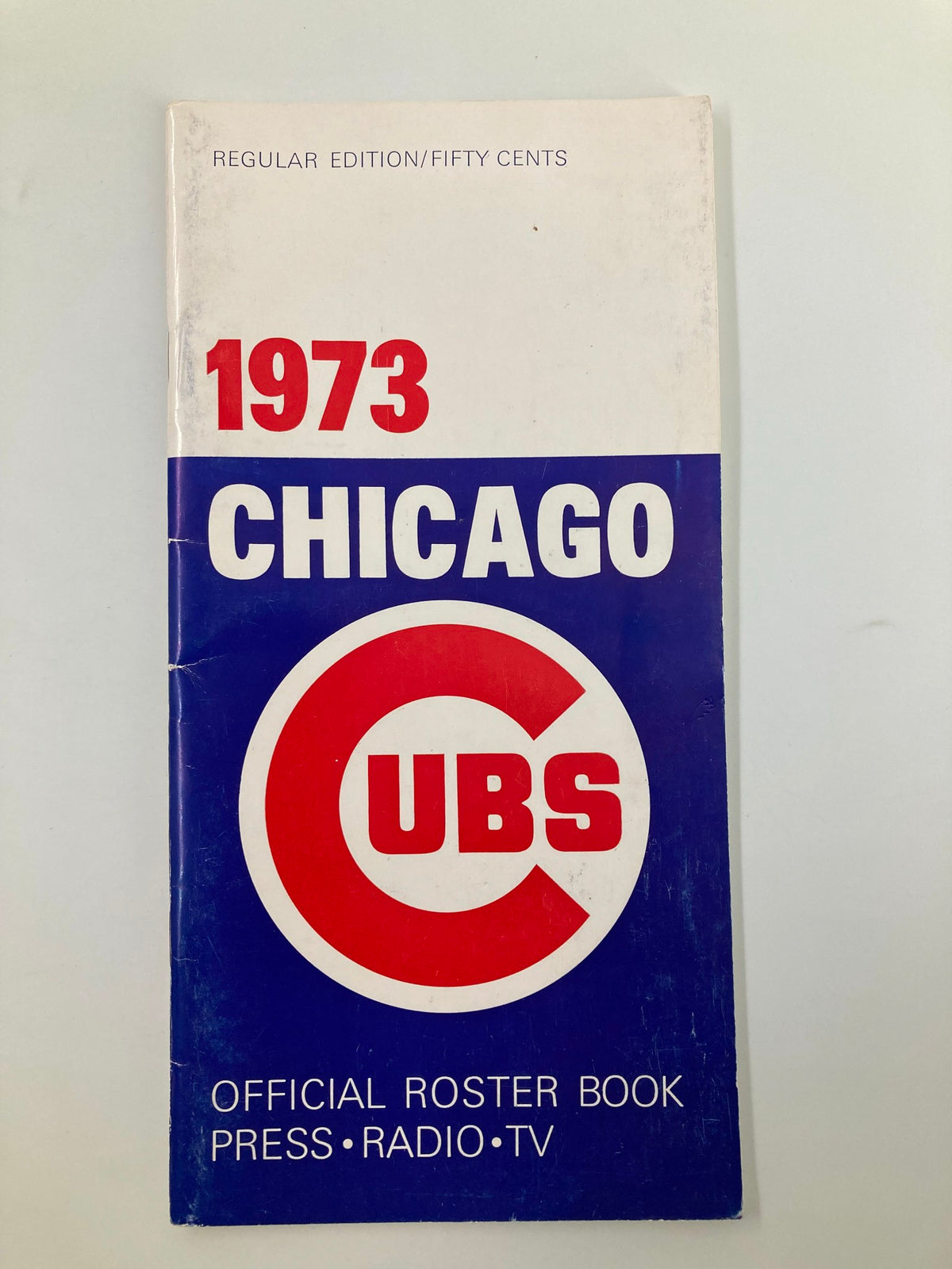 1973 MLB Chicago Cubs Official Roster Book cover showcasing the title and team logo, vintage design, and publication information.