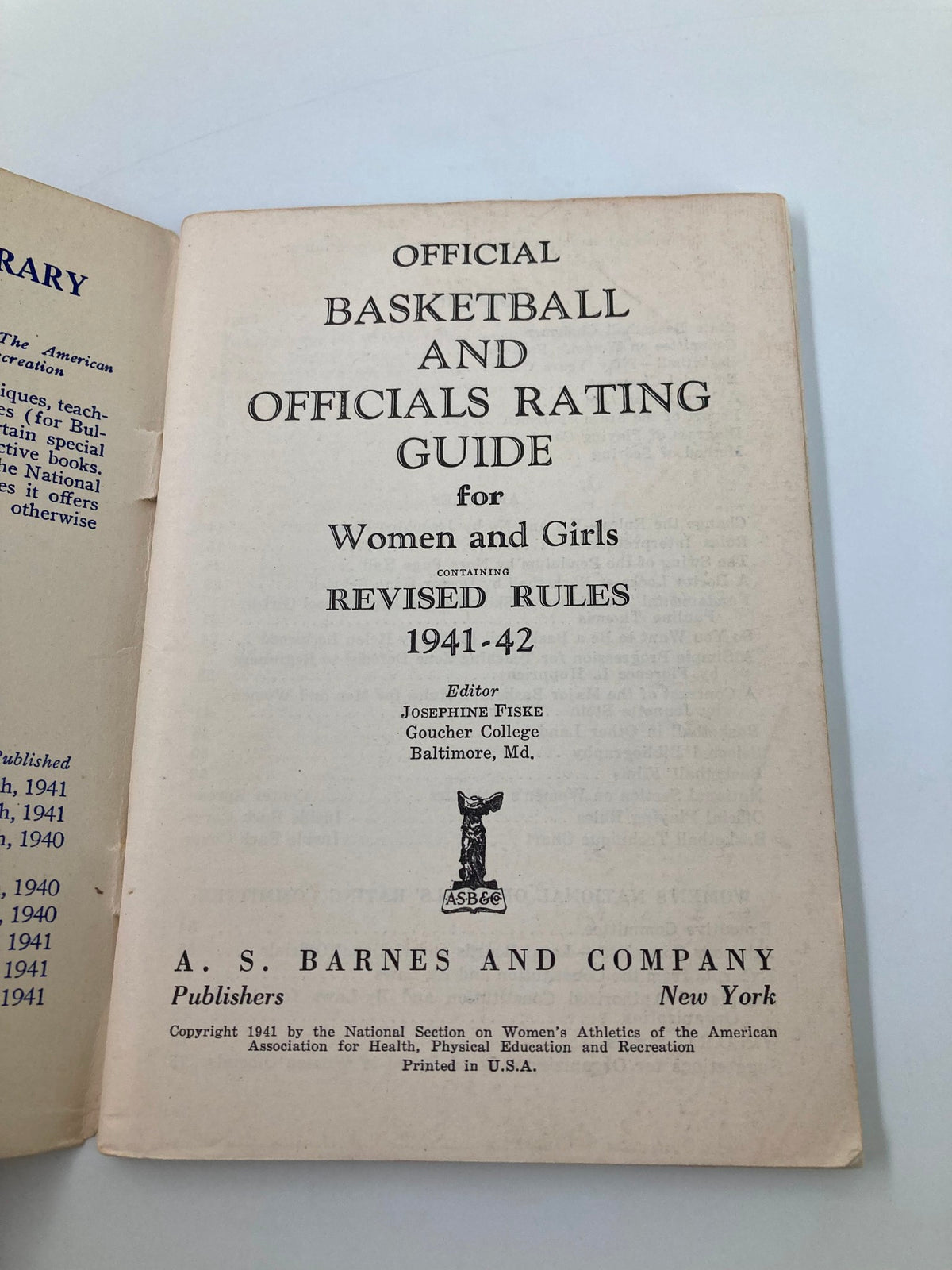 Inside page of the 1941-1942 Official Basketball and Officials Rating Guide for Women and Girls, displaying the title and publication details of the guide.