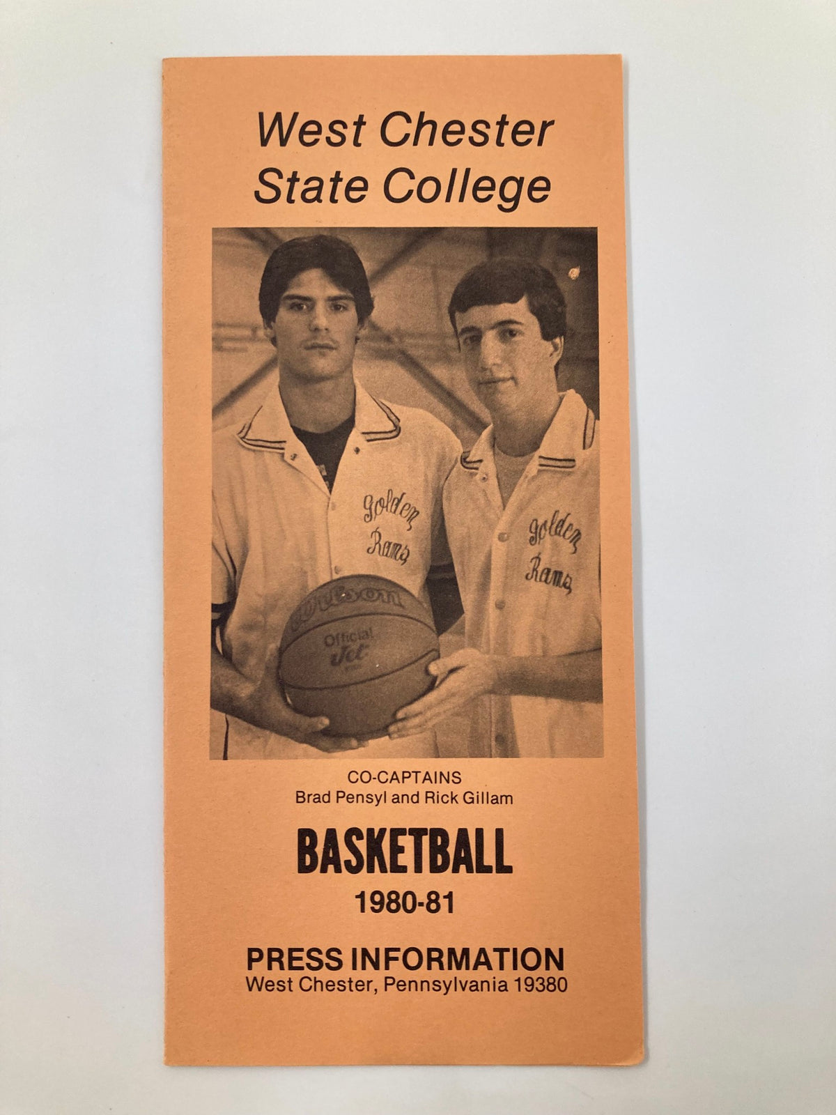 Front cover of the 1980-1981 NCAA West Chester Golden Rams Index Basketball Press Information featuring co-captains Brad Pensyl and Rick Gillam with a basketball in hand.