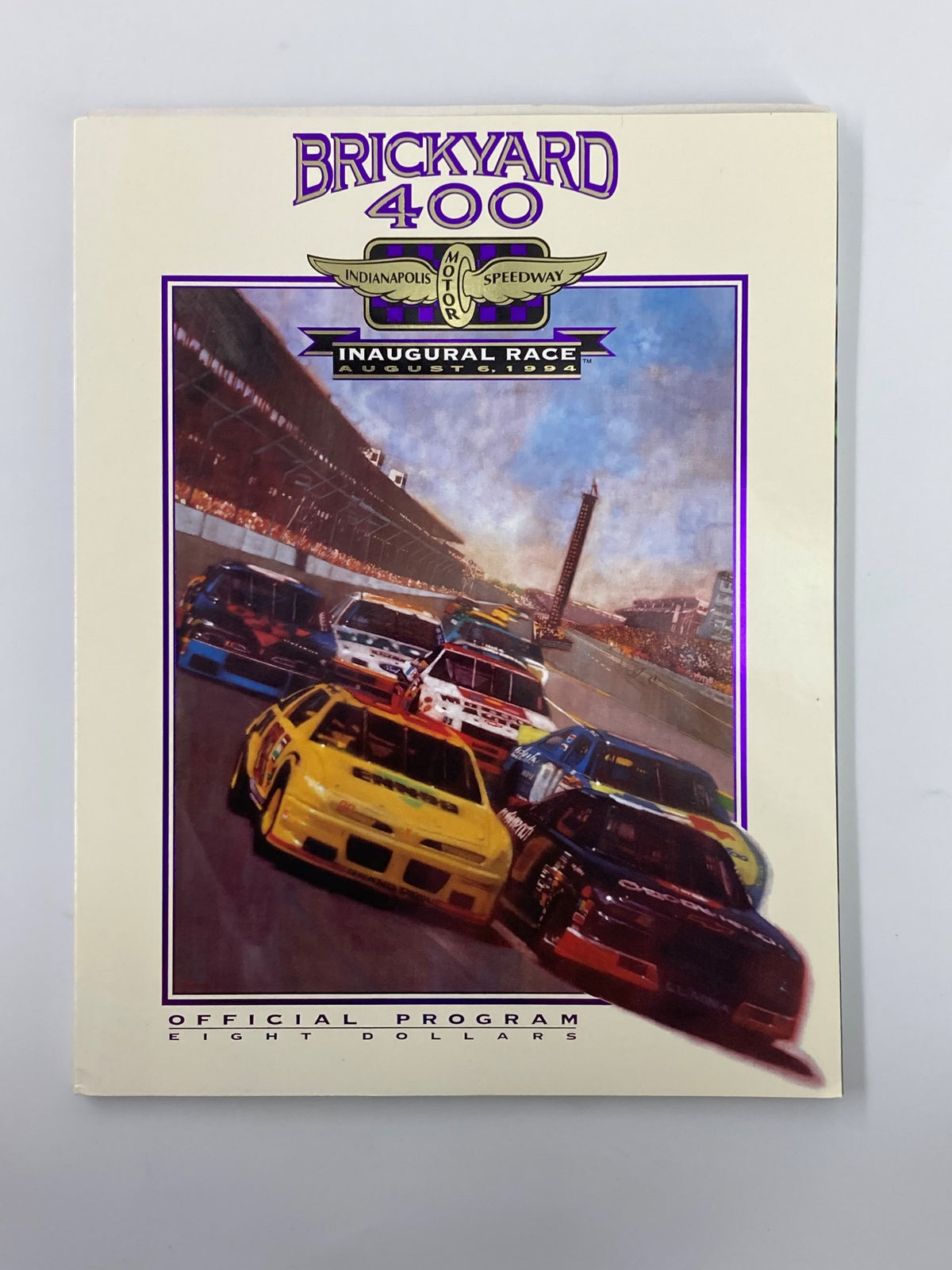 Cover of the August 6 1994 Brickyard 400 Indianapolis Motor Speedway Official Program featuring a colorful illustration of racing cars.