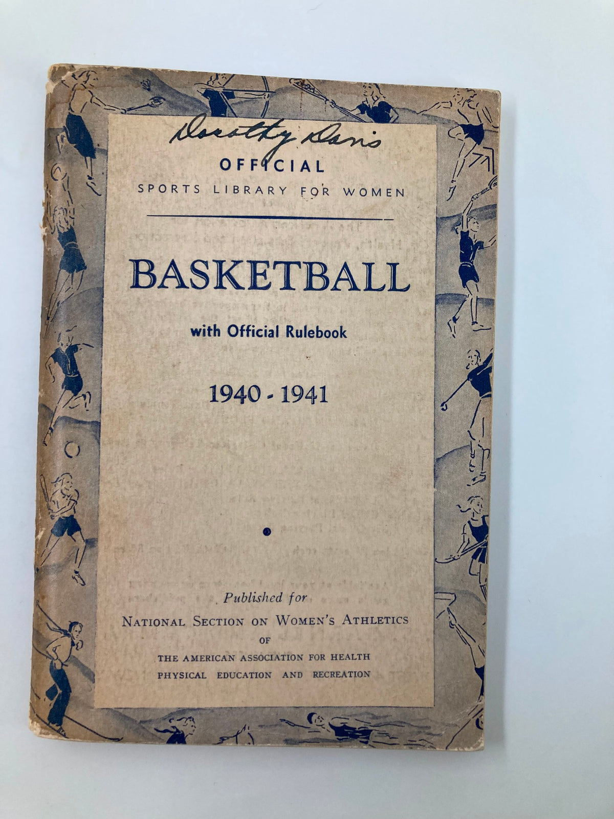 1940-1941 Official Basketball Guide for Women and Girls cover featuring vintage design and title.