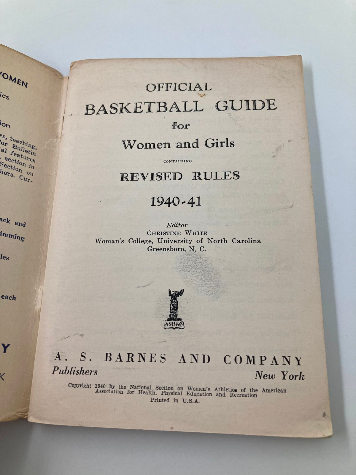 Interior page of the 1940-1941 Official Basketball Guide for Women and Girls, detailing the revised rules edited by Christine White.