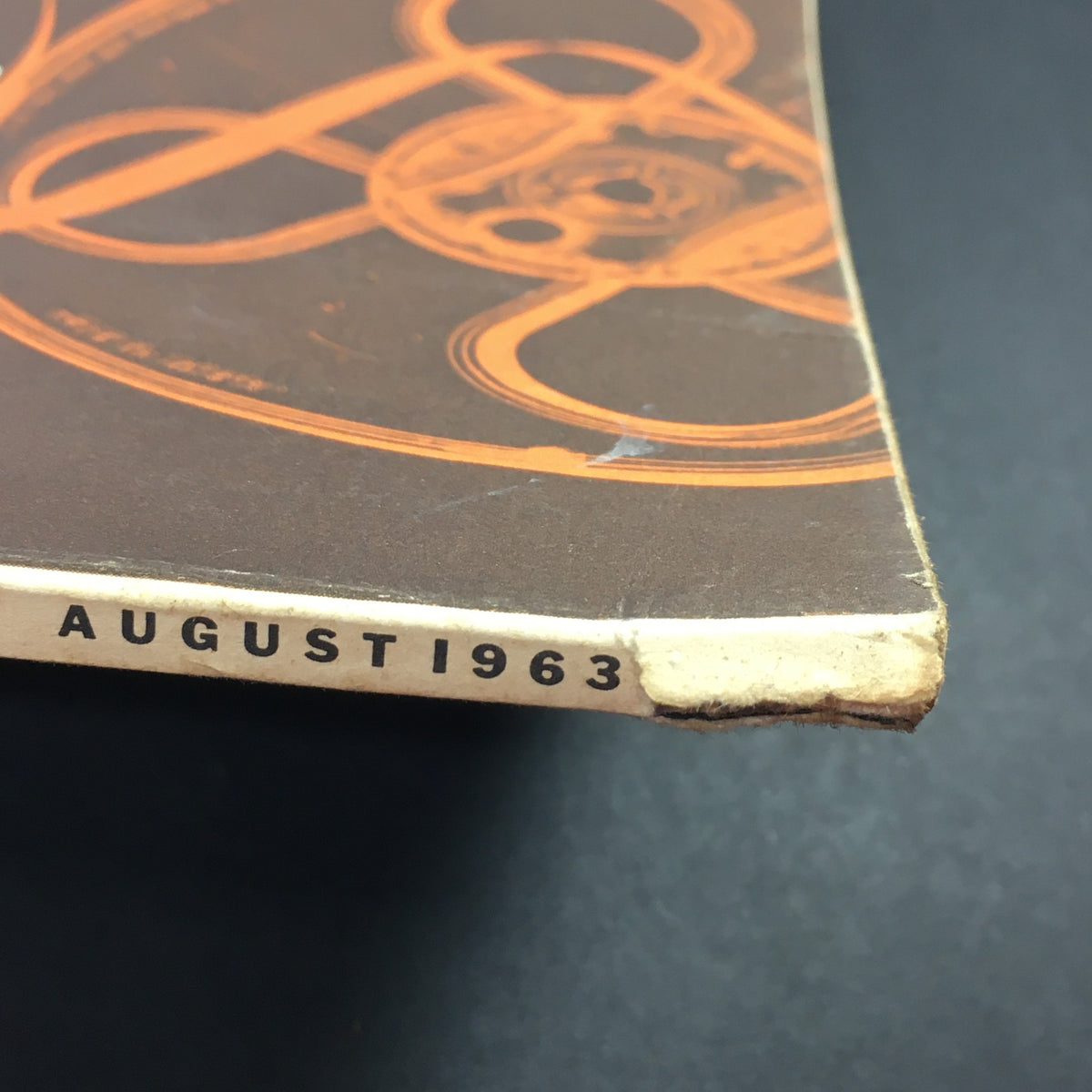 Close-up of the spine of VTG High Fidelity Music Magazine from August 1963 showing minor wear and the publication date.