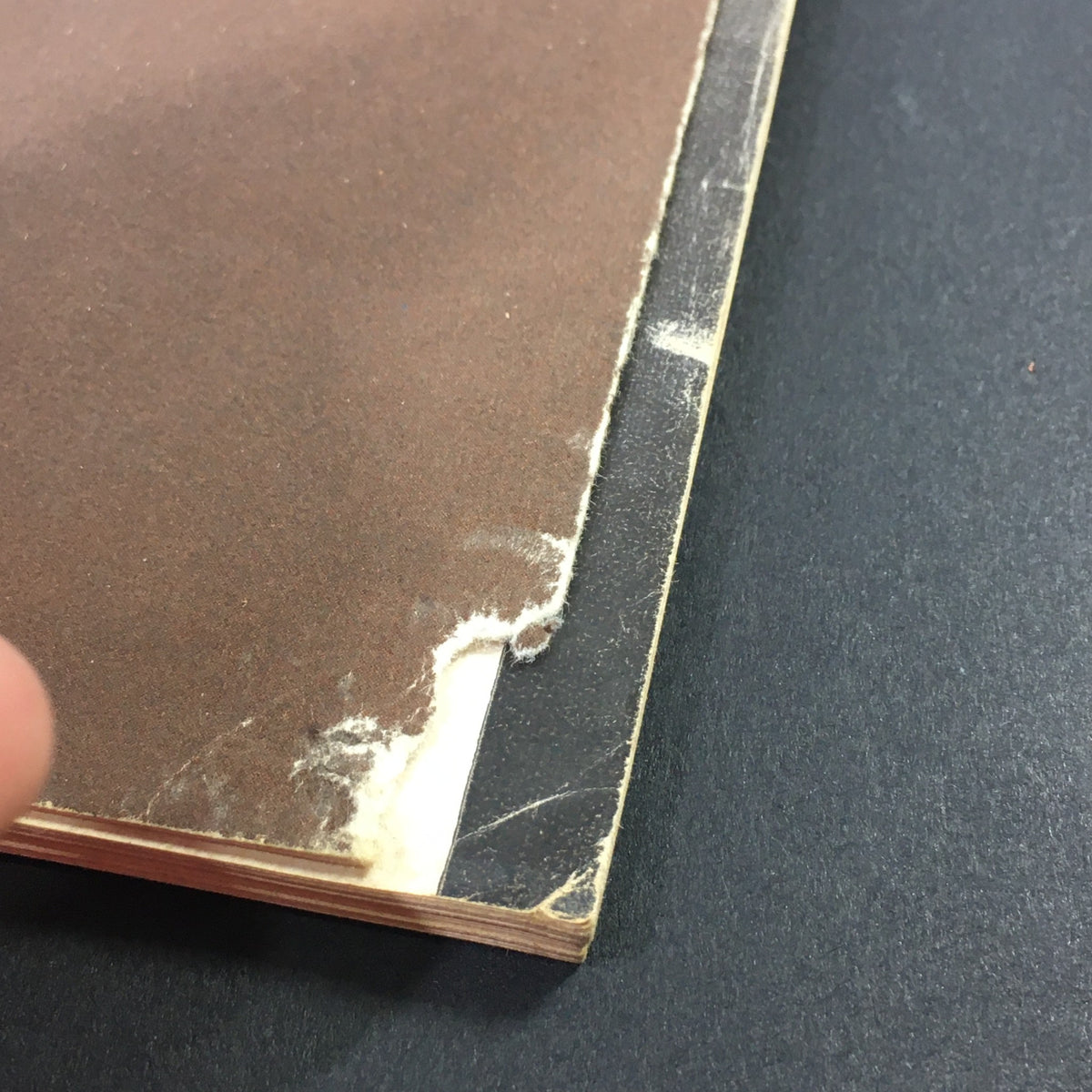 Detail of the edge of VTG High Fidelity Music Magazine from August 1963 showcasing slight damage and the vintage quality.
