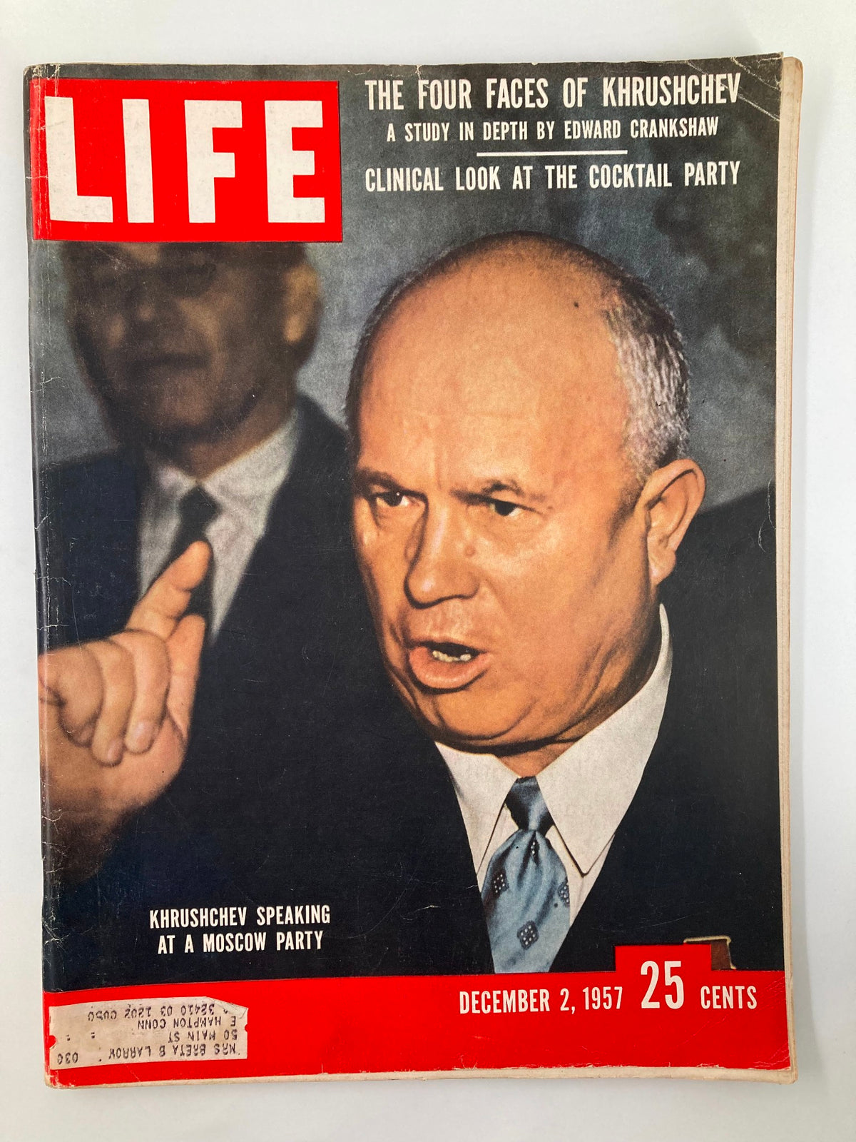 Cover of Life Magazine dated December 2, 1957, featuring Nikita Khrushchev speaking at a Moscow Party. The cover includes the headline 'THE FOUR FACES OF KHRUSHCHEV' along with a bold red 'LIFE' logo. The image captures Khrushchev in a dynamic pose, emphasizing his role in Cold War politics.