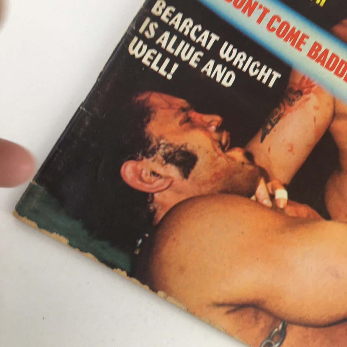 Close-up of the Wrestling Guide October 1974 cover, emphasizing Bearcat Wright's feature and details of the vintage wrestling magazine.