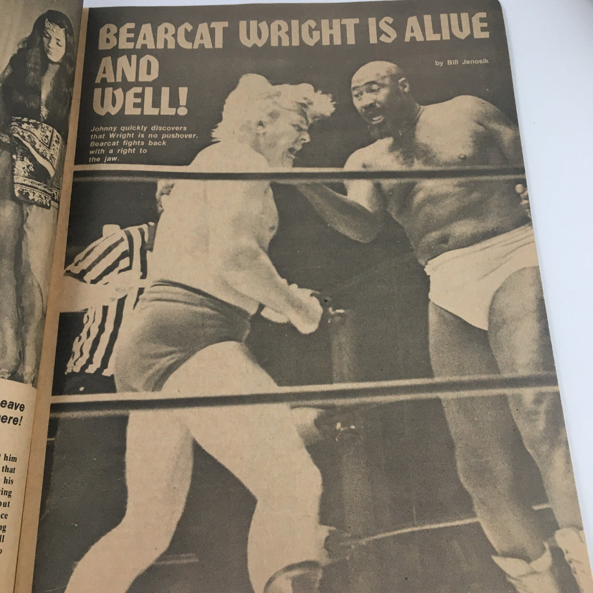 Wrestling Guide October 1974 Ivan Putski, Bearcat Wright & Tex McKenzie showing Bearcat Wright engaged in an intense wrestling match.