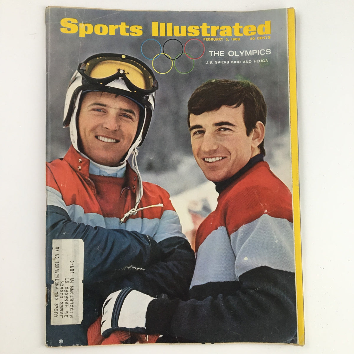 Cover of Sports Illustrated Magazine February 5, 1968, featuring US skiers Billy Kidd and Jimmie Heuga, with Olympic rings in the background, celebrating winter sports history.