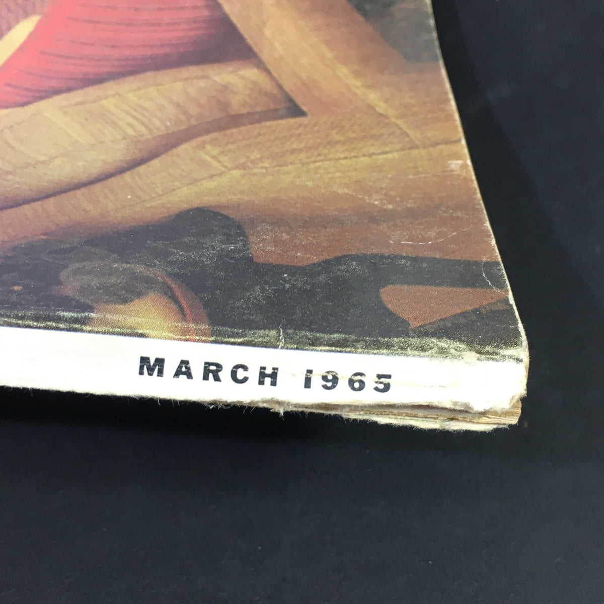 Bottom edge detail of the VTG High Fidelity Music Magazine March 1965, showcasing the month and year of publication.