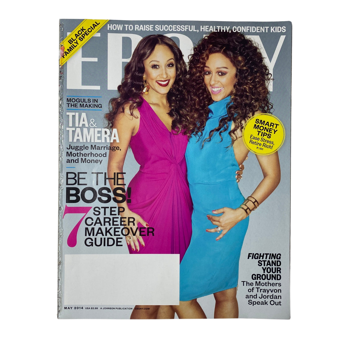 Cover of Ebony Magazine May 2014 featuring Tia and Tamera Mowry. The magazine emphasizes themes of juggling marriage, motherhood, and money with vibrant images and bold text. Volume LXIX, No. 7.