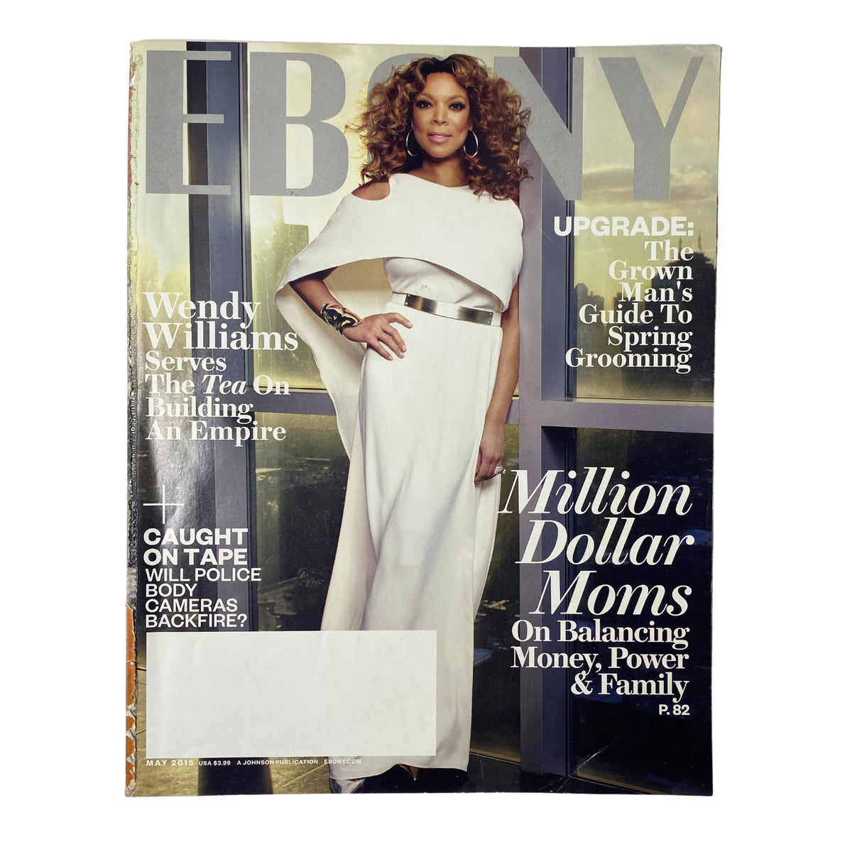 Ebony Magazine May 2015 Vol 70 No. 7 featuring Wendy Williams on the cover, showcasing her elegant style in a white dress with a belt, capturing the essence of modern motherhood and media.