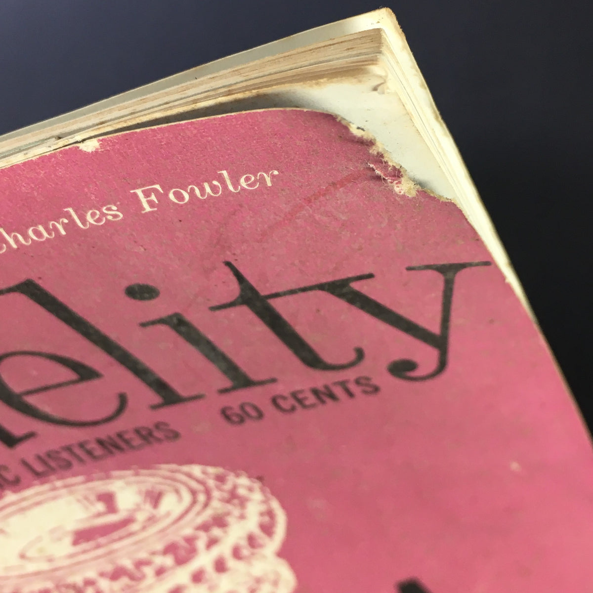 Close-up view of the spine of the VTG High Fidelity Music Magazine November 1960, highlighting minor wear and the title printed on the cover.