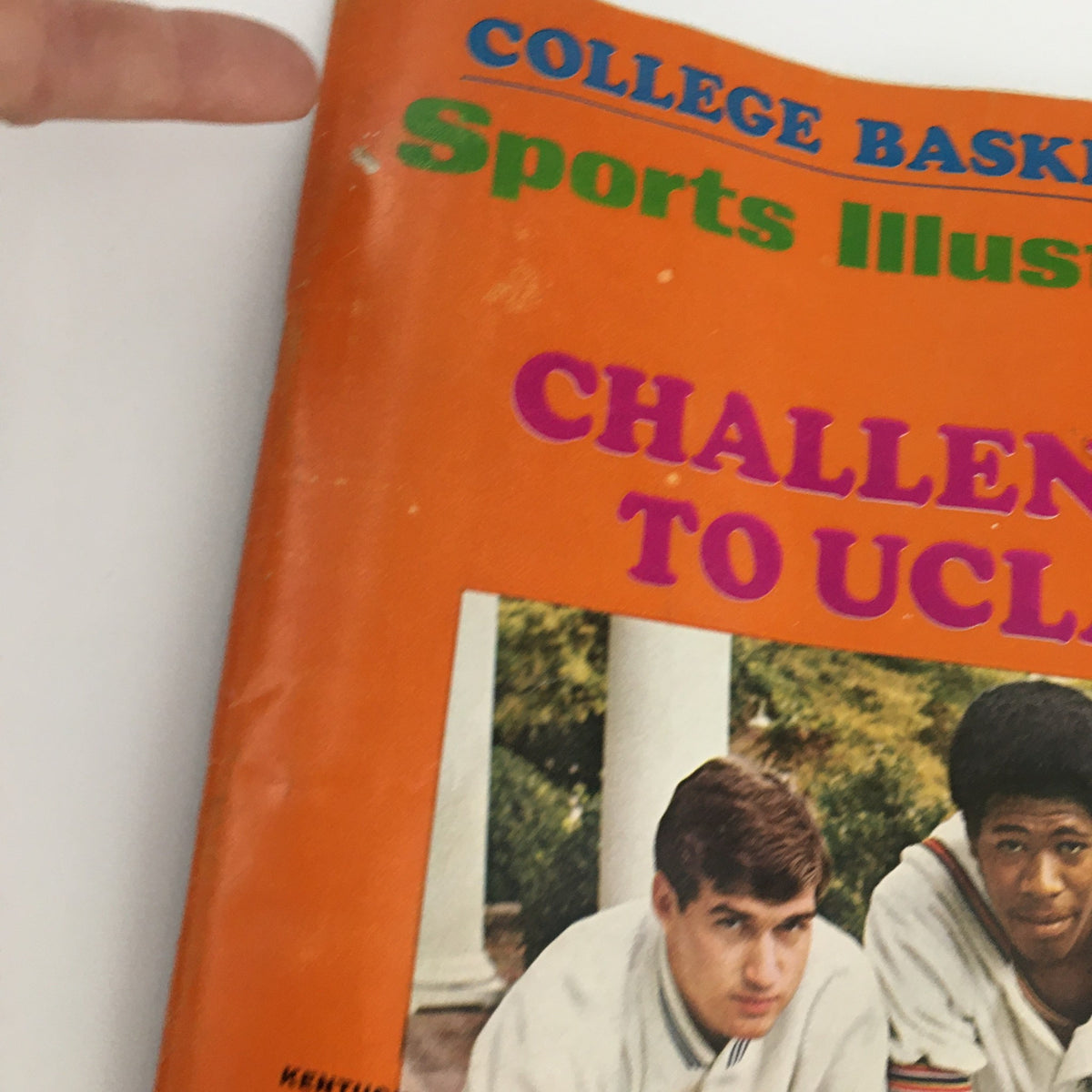 Close-up view of the Sports Illustrated Magazine cover from December 2, 1968, showcasing 'Challenge to UCLA' along with details of featured athletes from Kentucky and Davidson.