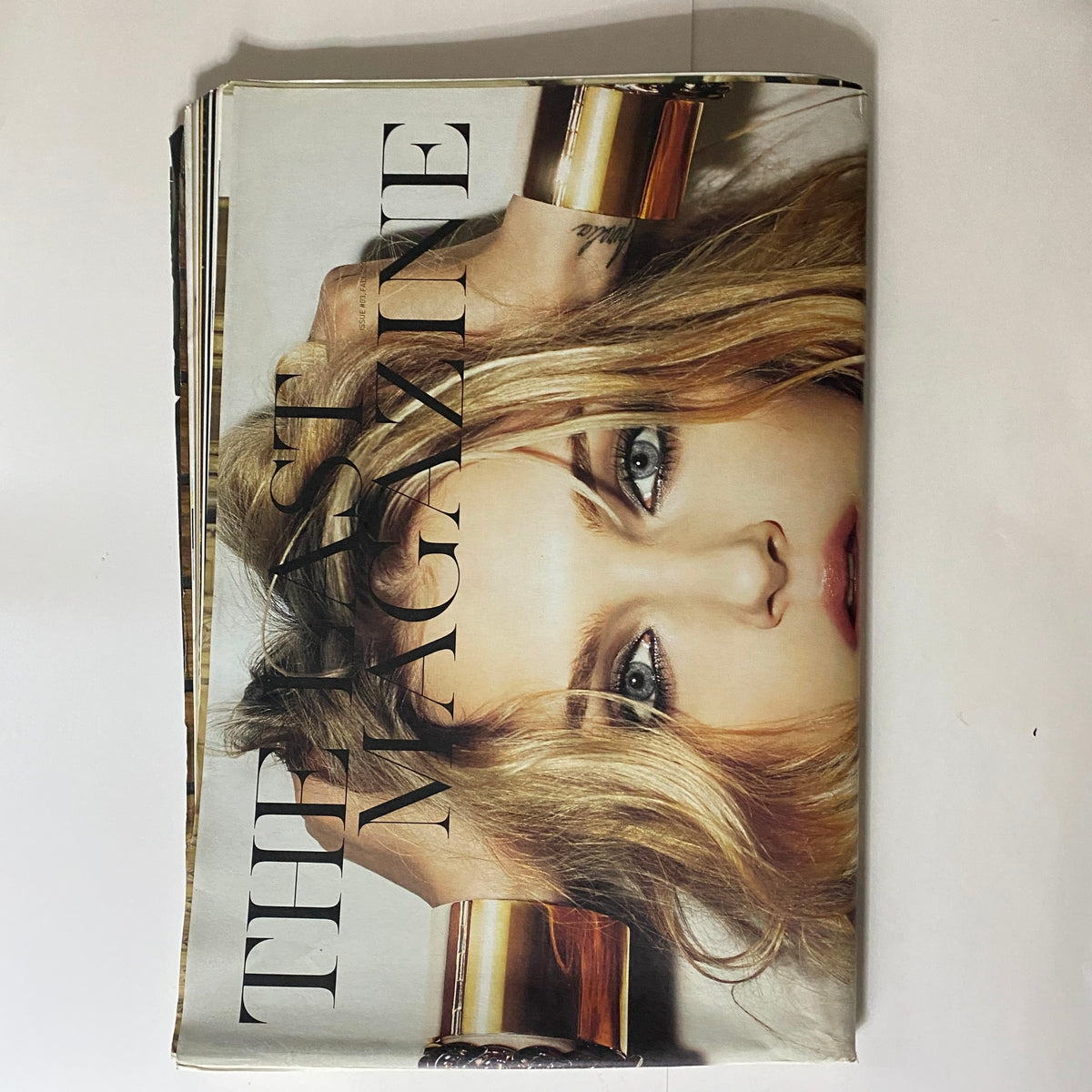 Cover of The Last Magazine Fall 2009 No. 03 featuring a model with wavy hair and striking eyes, showcasing stylish typography.