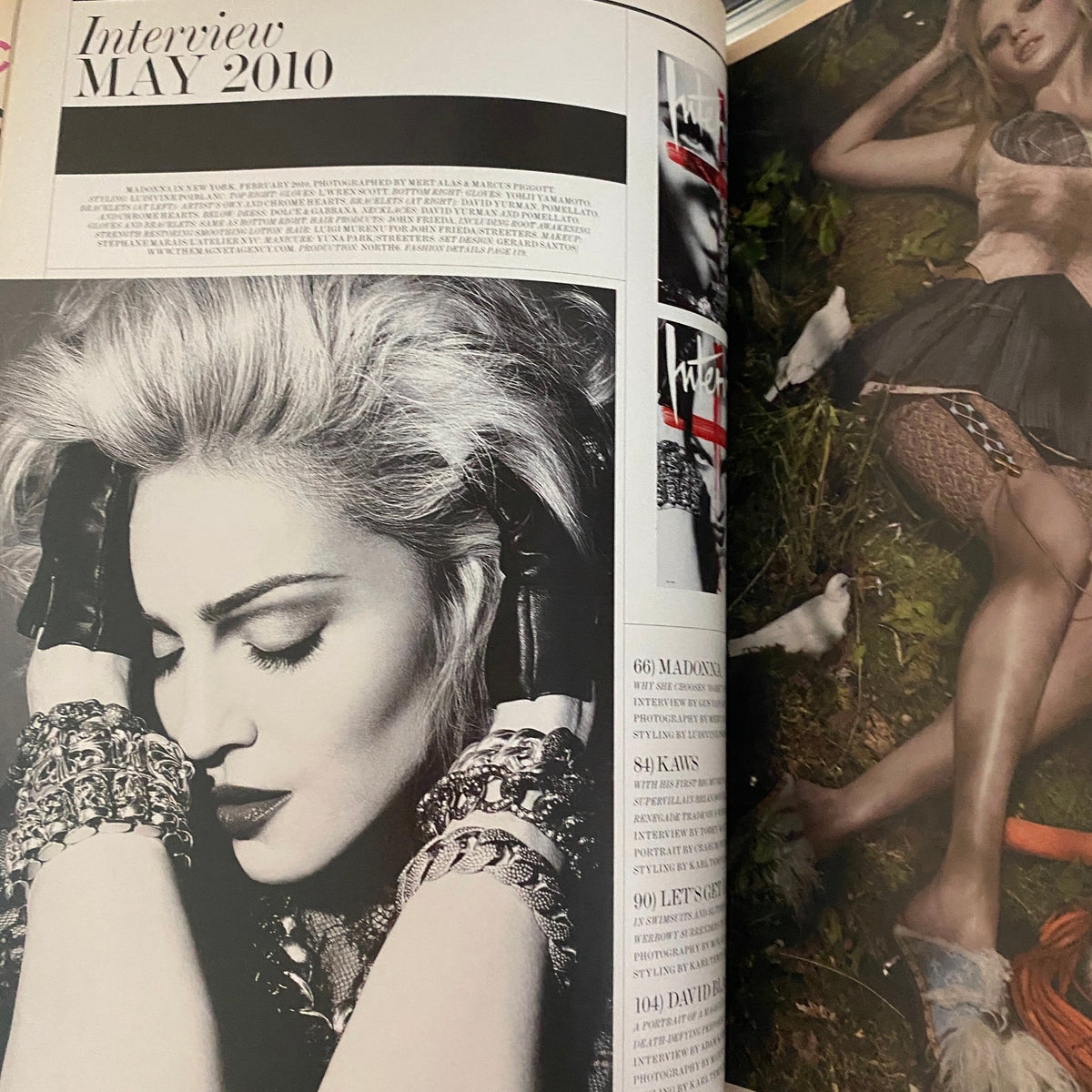 Inside page of Interview Magazine May 2010 showcasing Madonna styled with dramatic makeup and accessories, highlighting her influence in the music industry.