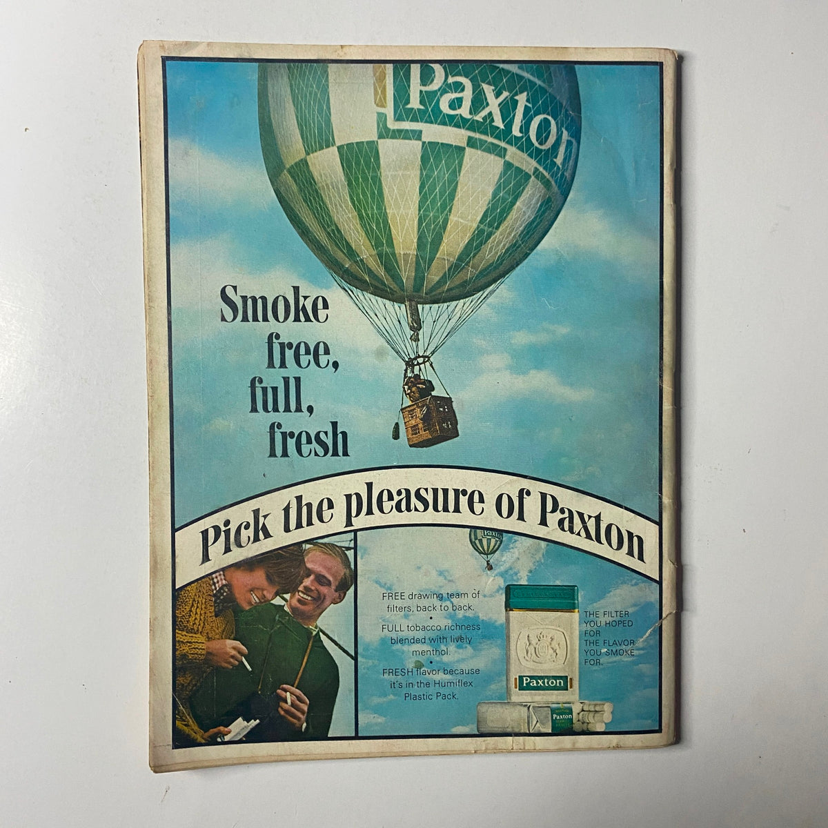 Back cover of Time Magazine November 29, 1963 Vol 82 No. 22 promoting Paxton cigarettes with a colorful advertisement featuring a hot air balloon, emphasizing the era's marketing style.