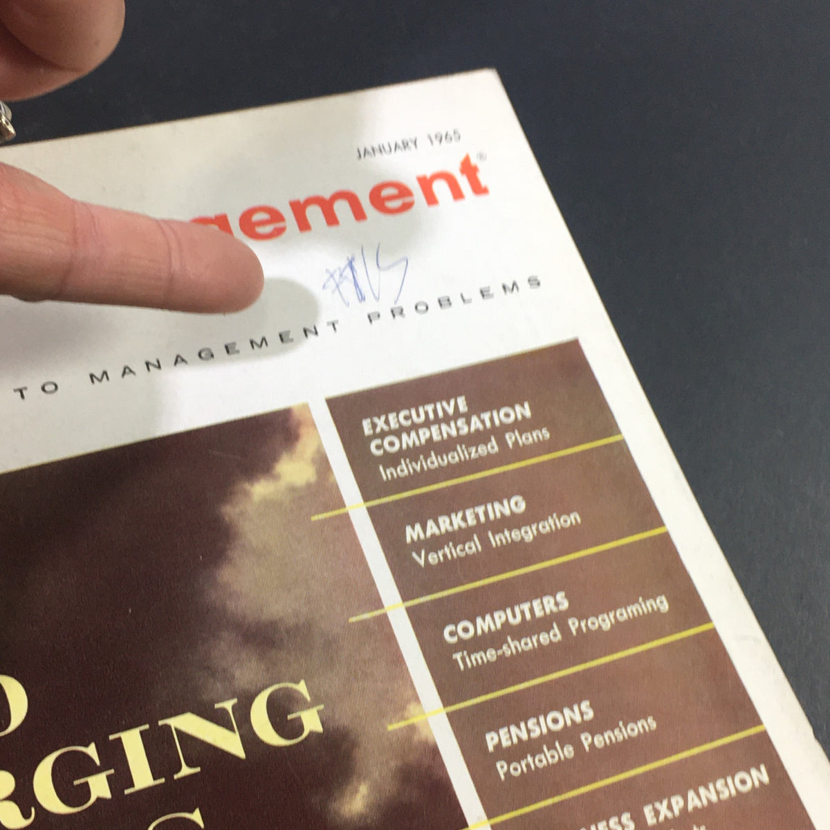 Close-up of the cover of VTG Business Management Magazine January 1965, highlighting topics like Executive Compensation and Marketing.