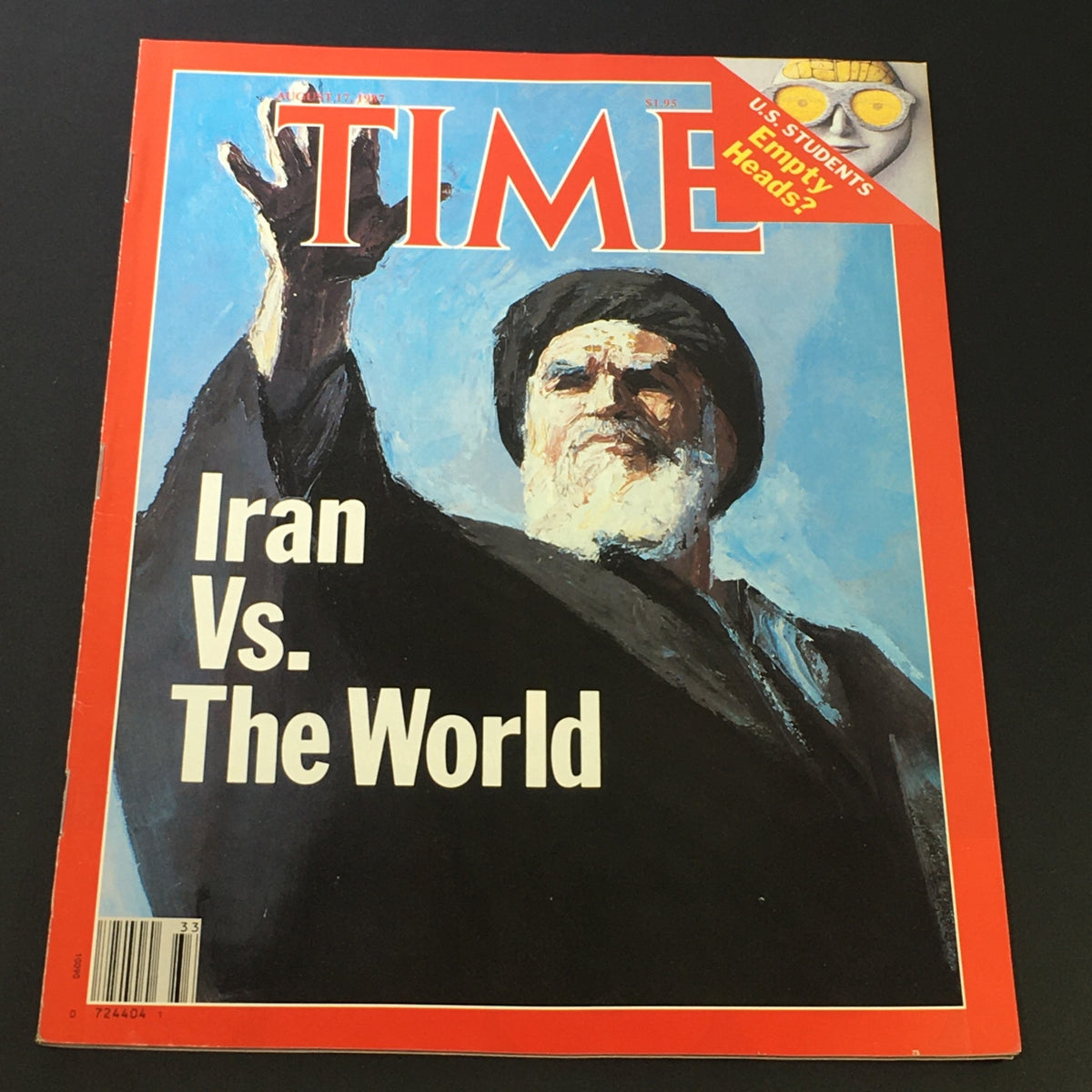 Time Magazine August 17 1987 cover featuring the title 'Iran vs The World', showcasing a dramatic illustration of a bearded figure raising a hand, reflecting political themes of the era.